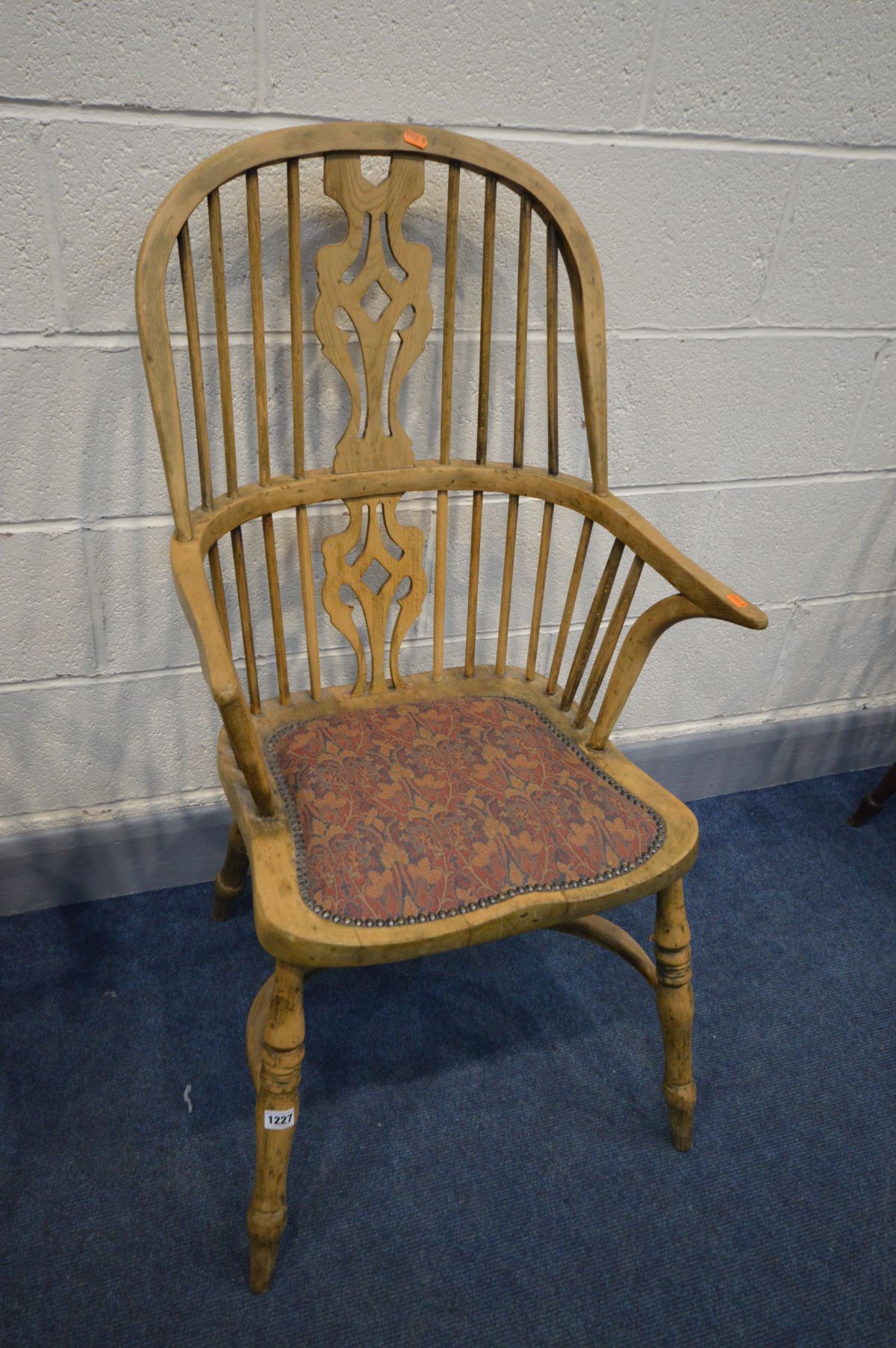 A BEECH SPINDLE BACK WINDSOR ARMCHAIR with a crinoline stretcher