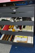 A SIX DRAWER CABINET CONTAINING A LARGE NUMBER OF ASSORTED LOCOMOTIVES AND SOME ROLLING STOCK
