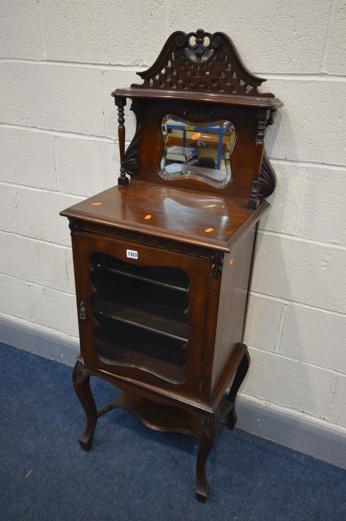 A LATE VICTORIAN MAHOGANY DISPLAY CABINET with a raised mirror back, width 50cm x depth 47cm x