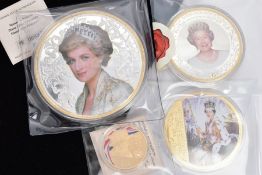 A GROUP OF ROYALTY COIN/MEDAL to include a large 376g silver and gold layered item with pictorial