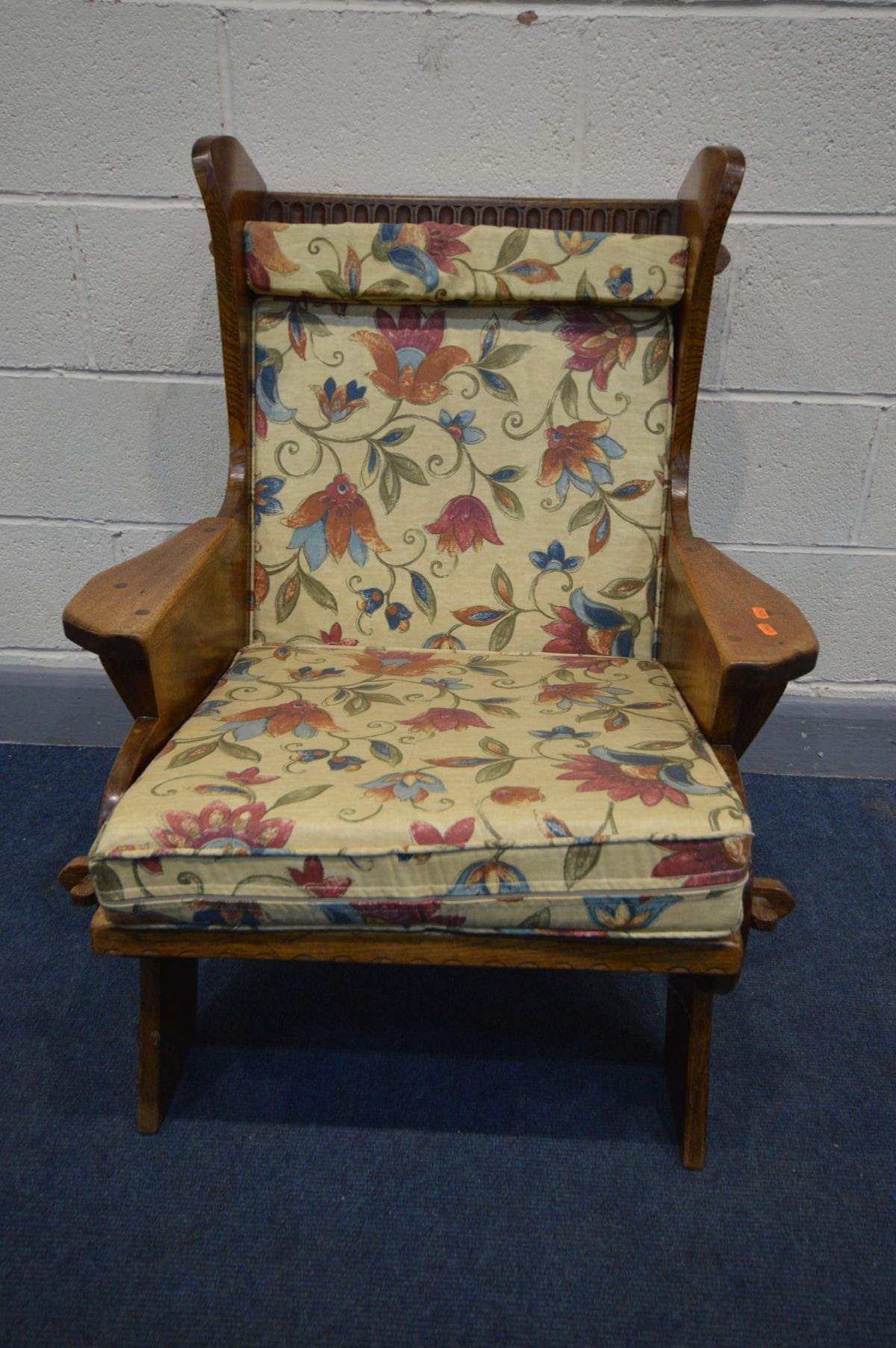 AN ARTS AND CRAFTS OAK ARMCHAIR, with open peg joints, and later cushions, width 73cm x inner seat - Image 2 of 4