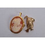 A 9CT GOLD PENDANT AND A YELLOW METAL CAMEO BROOCH/PENDANT, the first a hollow pendant in the form