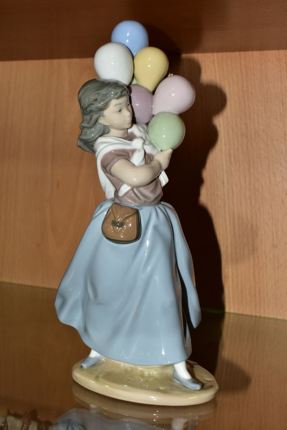 A LLADRO FIGURE 5141 'Balloon Seller', designed by Vincente Martinez, issued 1982-1996, height - Image 5 of 6