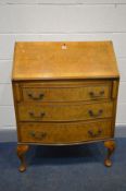 A BURR WALNUT BUREAU, with a fitted interior on cabriole legs, width 74cm x depth 45cm x height