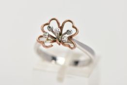 A 9CT WHITE GOLD DRESS RING, of flower design with four open heart shape rose gold petals and five