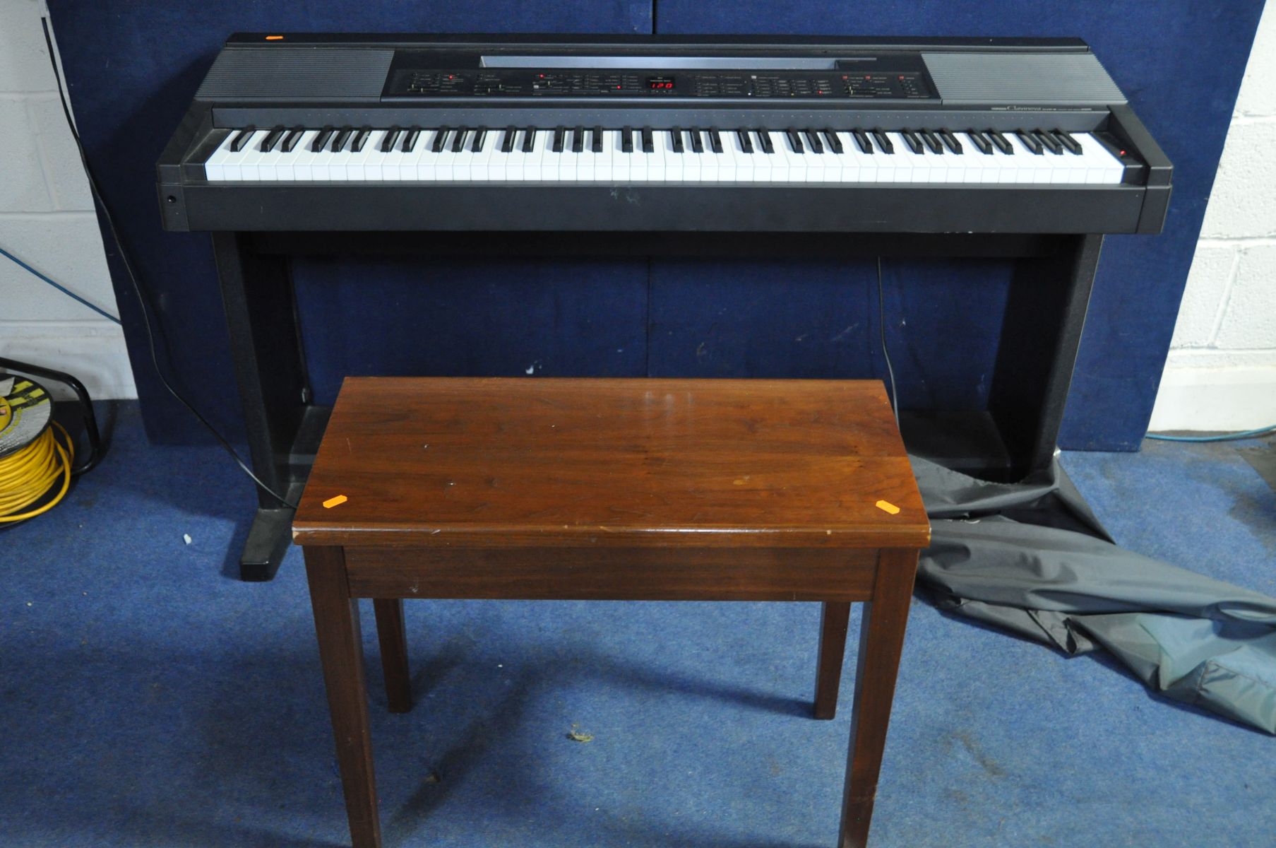 A YAMAHA CLAVINOVA CVP-8 DIGITAL PIANO on stand with cover (PAT pass, all keys appear to be working)