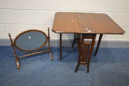 AN EDWARDIAN MAHOGANY SUTHERLAND TABLE, along with an Edwardian oval toilet mirror (2)