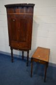 A GEORGIAN MAHOGANY BARREL TWO DOOR HANGING CORNER CUPBOARD, on a later stand, width 89cm x depth