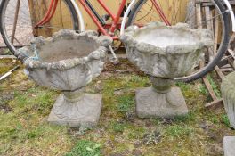 A PAIR OF TWO PIECE COMPOSITE GARDEN PLANTERS with Acanthus Leaf bowl to top and square bases 48cm