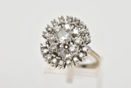 A MODERN DIAMOND CLUSTER RING, centring on a modern round brilliant diamond, estimated weight 0.