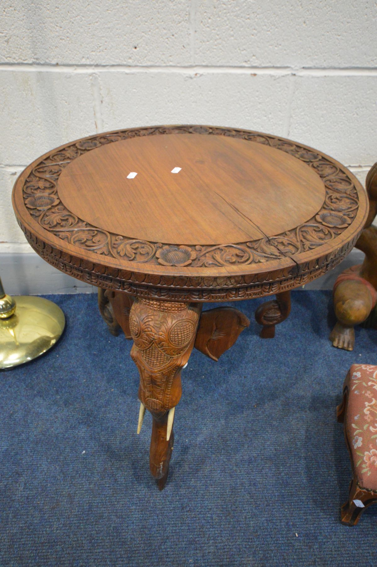 A HARDWOOD ANGLO INDIAN ELEPHANT OCCASSIONAL TABLE, diameter 58cm x height 52cm (split to top and - Image 3 of 3