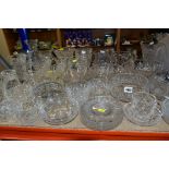 A COLLECTION OF ASSORTED GLASSWARE, mostly vases, bowls and jugs, includes some Stuart Crystal,