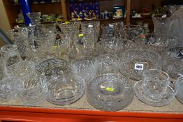 A COLLECTION OF ASSORTED GLASSWARE, mostly vases, bowls and jugs, includes some Stuart Crystal,