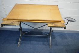 A HARPER AND TUNSTALL RATIONAL DRAUGHTSMANS TABLE, on an industrial adjustable stand, with