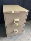 A REMINGTON RAND METAL TWO DRAWER FILING CABINET