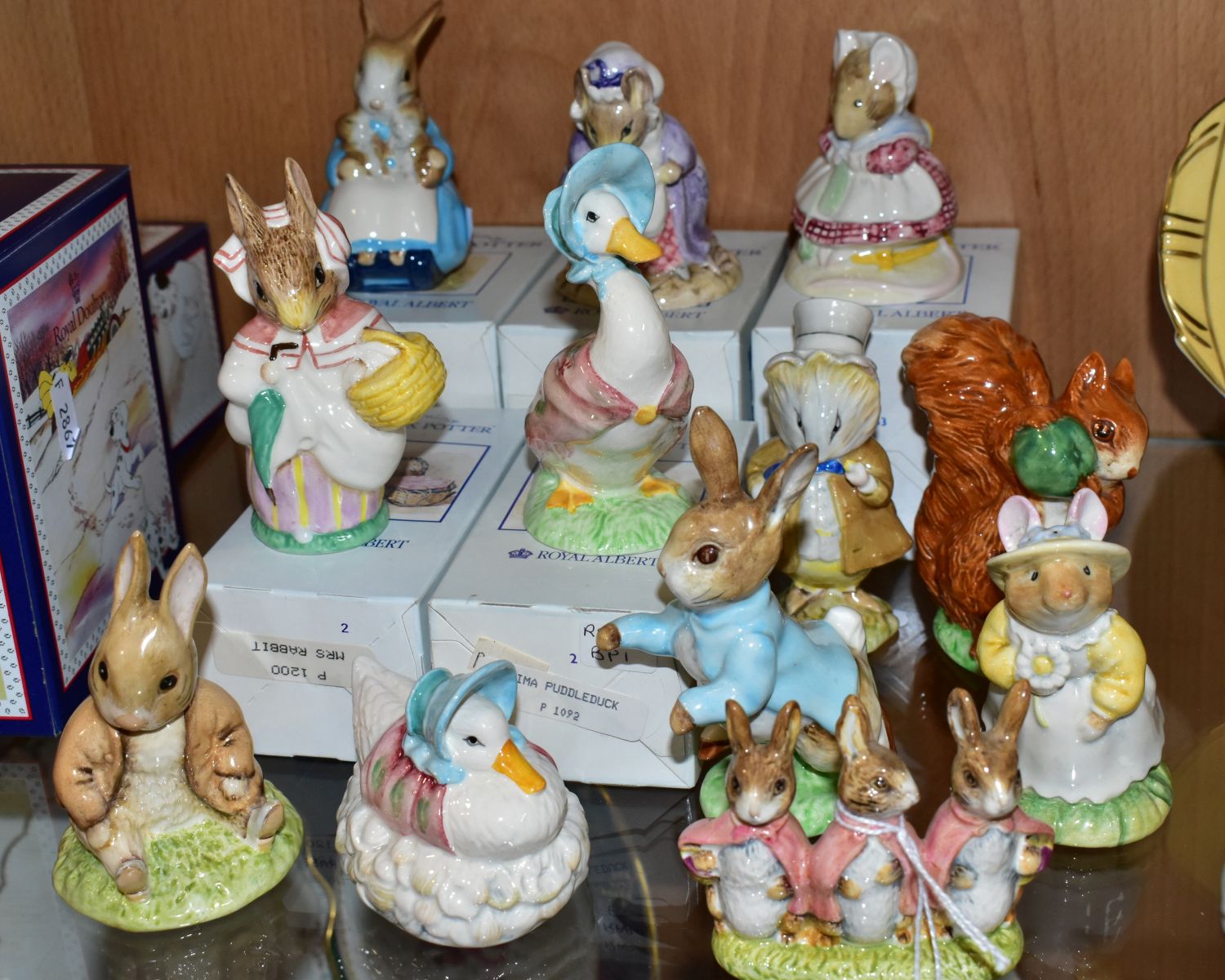 ELEVEN BEATRIX POTTER FIGURES, comprising six Beswick Flopsy, Mopsy and Cottontail, Amiable Guinea-