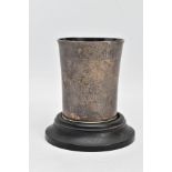 AN EARLY VICTORIAN SILVER BEAKER WITH COASTER, plain polished tapered beaker, stepped rim to the