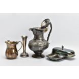 A SELECTION OF ITEMS, to include an AF, white metal floral and foliate embossed water jug, (