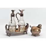 A GEORGE III SILVER OIL AND VINEGAR TRAY WITH CUT GLASS AND SILVER PLATED OIL AND VINEGAR JUGS AND
