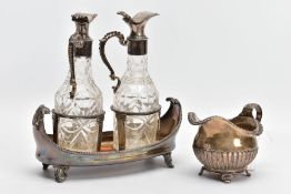 A GEORGE III SILVER OIL AND VINEGAR TRAY WITH CUT GLASS AND SILVER PLATED OIL AND VINEGAR JUGS AND