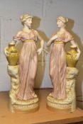 A PAIR OF ROYAL DUX FIGURES OF FEMALE WATER CARRIERS IN CLASSICAL DRESS, impressed numbers 2063