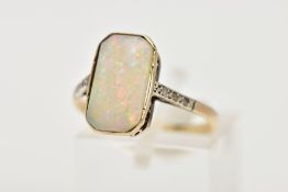 AN OPAL AND DIAMOND RING, the rectangular opal within a milligrain setting with diamond detail to