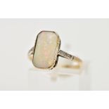 AN OPAL AND DIAMOND RING, the rectangular opal within a milligrain setting with diamond detail to