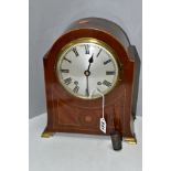 AN EARLY 20TH CENTURY MAHOGANY AND INLAID DOME TOP MANTEL CLOCK, silvered dial, black Roman