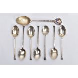 SEVEN SILVER COFFEE SPOONS AND AN ENAMELLED SILVER TEASPOON, to include six plain polished coffee
