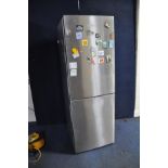 A GRUNDIG STAINLESS STEEL FRIDGE FREEZER 174cm high (PAT pass and working at 5 and -19 degrees)