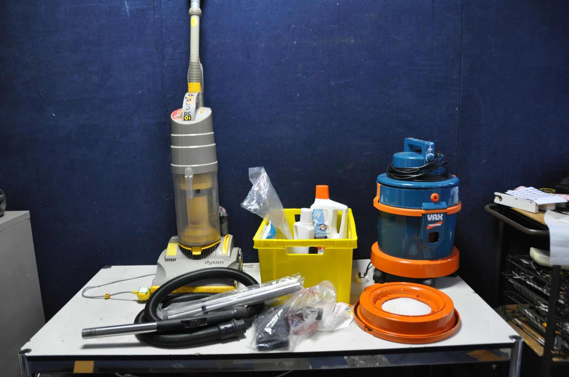 A VAX POWA 4000 WET AND DRY VACUUM CLEANER with tray of accessories and a Dyson DC01 vacuum