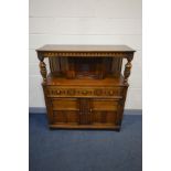 A REPRODUCTION OAK COURT CUPBOARD, width 124cm x depth 46cm x height 138cm