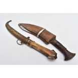 TWO MIDDLE EASTERN? ASIAN KUKRI STYLE DAGGERS with scabbards, poor condition, one with metal