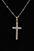 AN 18CT WHITE GOLD DIAMOND CROSS PENDANT NECKLACE, the pendant fourteen round brilliant cut