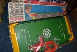 A VINTAGE IDEAL CROSSFIRE GAME with four shooters and ball bearing, target is missing, box tatty,