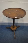 A GEORGIAN OAK CIRCULAR TOP DISH TOP OCCASIONAL TABLE, on a turned support, hexagonal base to triple
