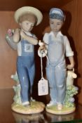 TWO LLADRO FIGURES OF BOYS, comprising 1286 'Flowers on the back', designed by Francisco Catala,