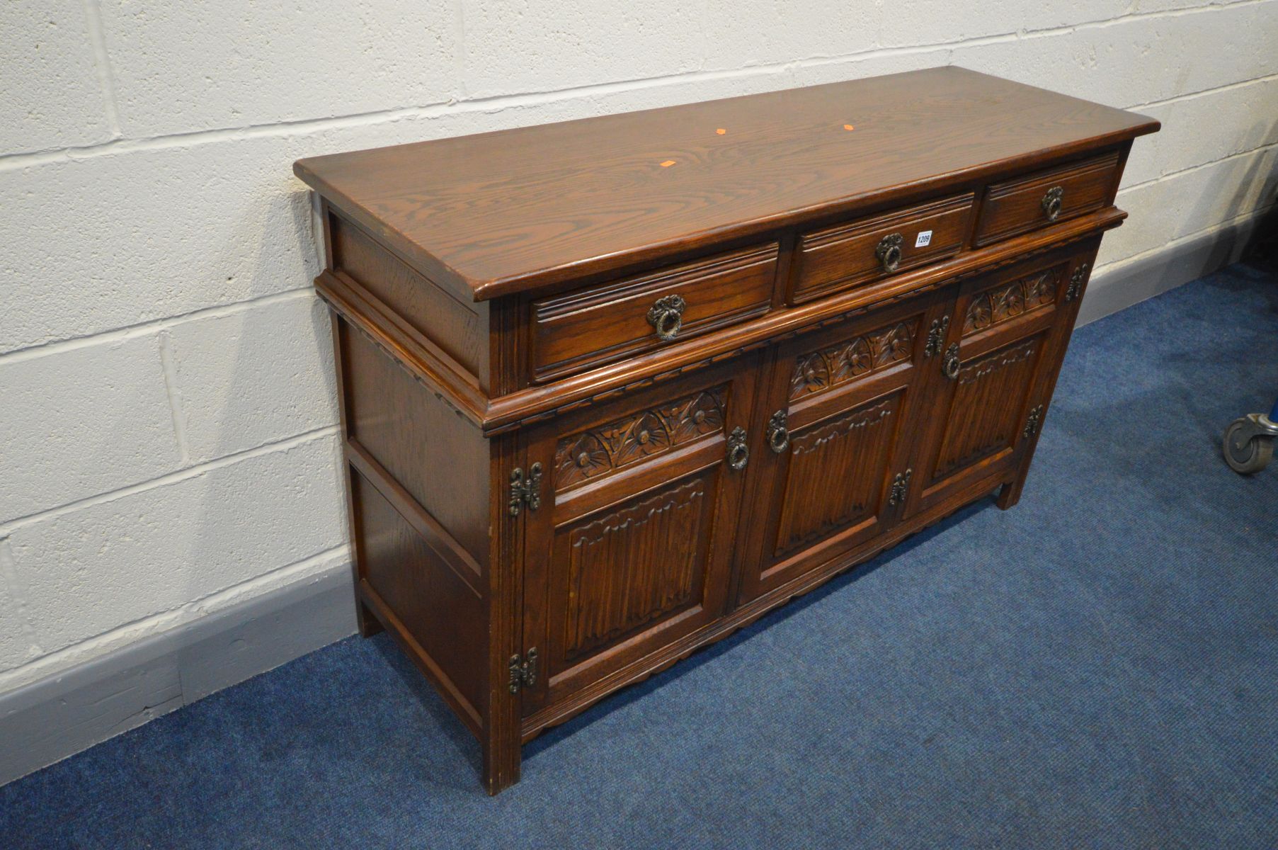 AN OLD CHARM SIDEBOARD, three drawers above three cupboard doors, width 136cm x depth 44cm x - Image 2 of 3