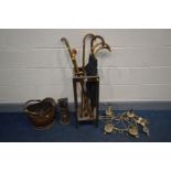 AN EARLY 20TH CENTURY OAK UMBRELLA STAND containing umbrellas together with a brass and copper