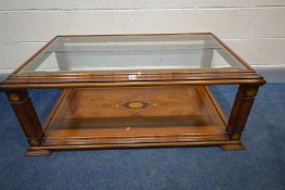 A REPRODUCTION WALNUT AND MARQUETRY INLAID COFFEE TABLE, in the style of William and Mary, with a