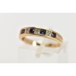A 9CT GOLD SEVEN STONE SAPPHIRE AND DIAMOND RING, the line of four circular cut sapphires