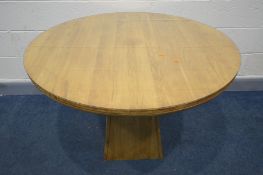 A SOLID OAK CIRCULAR TABLE on a square tapered base, diameter 109cm x height 77cm (with glass