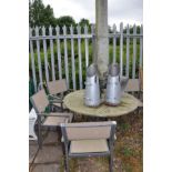 A ROUND HARDWOOD TOPPED GARDEN TABLE 120cm in diameter, with a tubular metal frame, four chairs,