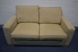A BEIGE UPHOLSTERED BED SETTEE, length 168cm