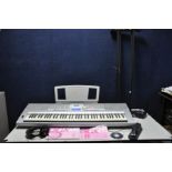 A YAMAHA DGX-205 PORTABLE GRAND KEYBOARD with PSU, manual, software, sustain pedal, stand and