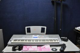 A YAMAHA DGX-205 PORTABLE GRAND KEYBOARD with PSU, manual, software, sustain pedal, stand and