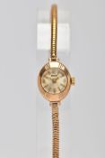 A LADIES 9CT GOLD 'ENICAR' WRISTWATCH, hand wound movement, round silver dial signed 'Enicar',