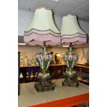 A PAIR OF ITALIAN CERAMIC TABLE LAMPS, possibly by Capodimonte, mounted onto gilt metal bases, the