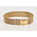 A 9CT GOLD HEAVY MESH BRACELET, approximate width 12.7mm, fitted with a fold over clasp,