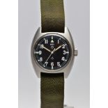 A GENTLEMAN'S MWC 6BB MILTARY ISSUE STAINLESS STEEL WATCH, a round black dial with Arabic hour